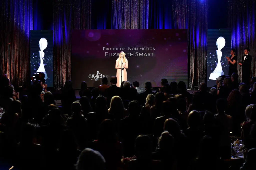 Smart engages in public speaking to raise awareness for example when she was onstage at the 43rd Annual Gracie Awards in 2018 (Photo by Frazer Harrison/Getty Images)