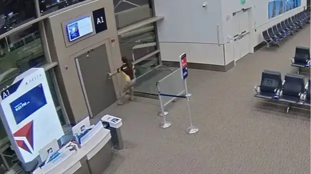 Parents of man who died crawling into plane engine sue Salt Lake City