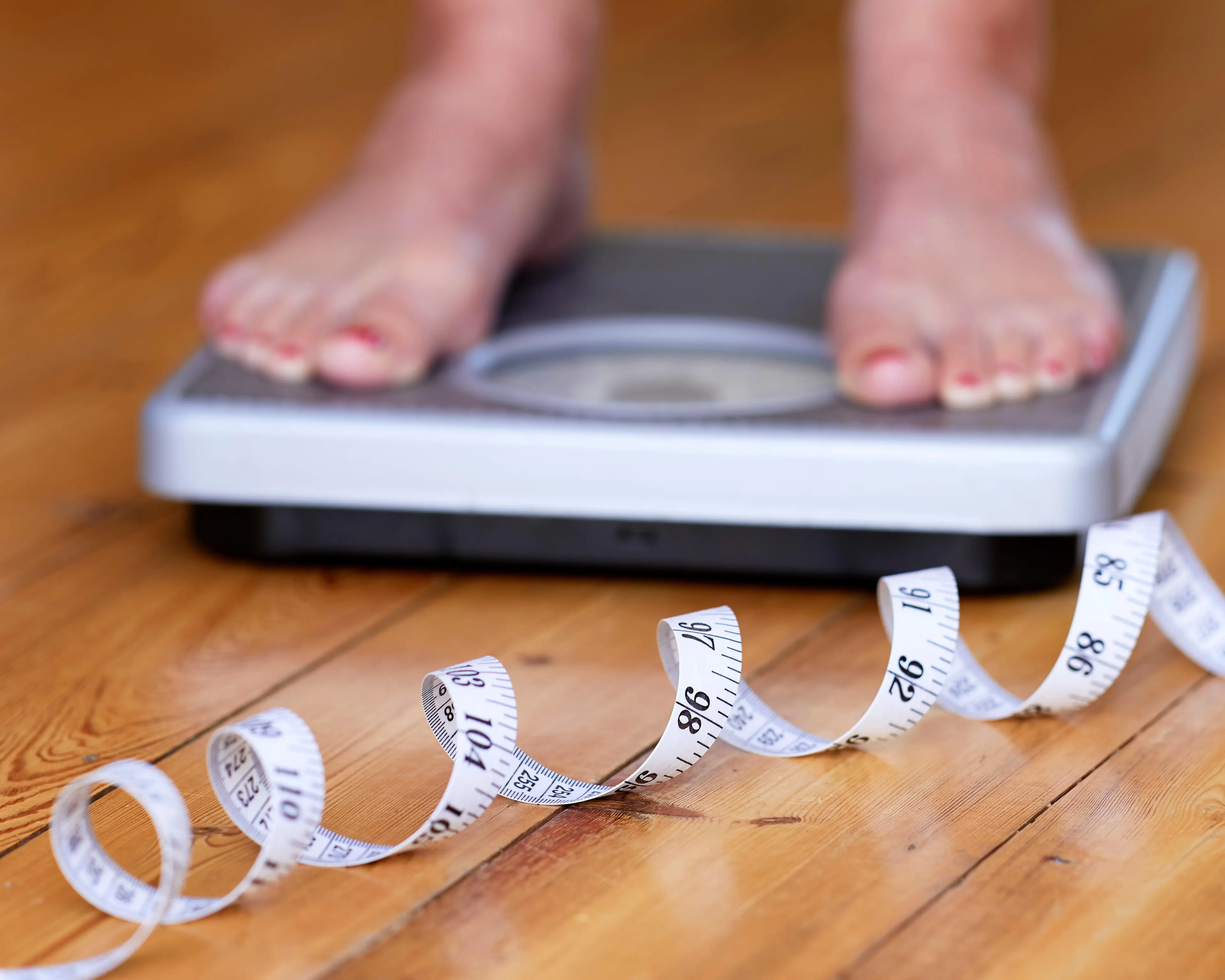 Those with a BMI of or over 30 should be advised by health professionals on how to lose weight according to NICE guidelines.