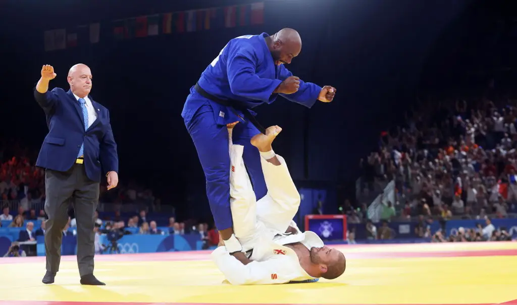 Teddy Riner is on track to compete for a gold medal at this 2024 Paris Olympics following his victory against Guram Tushishvili. (Xavier Laine/Getty Images)