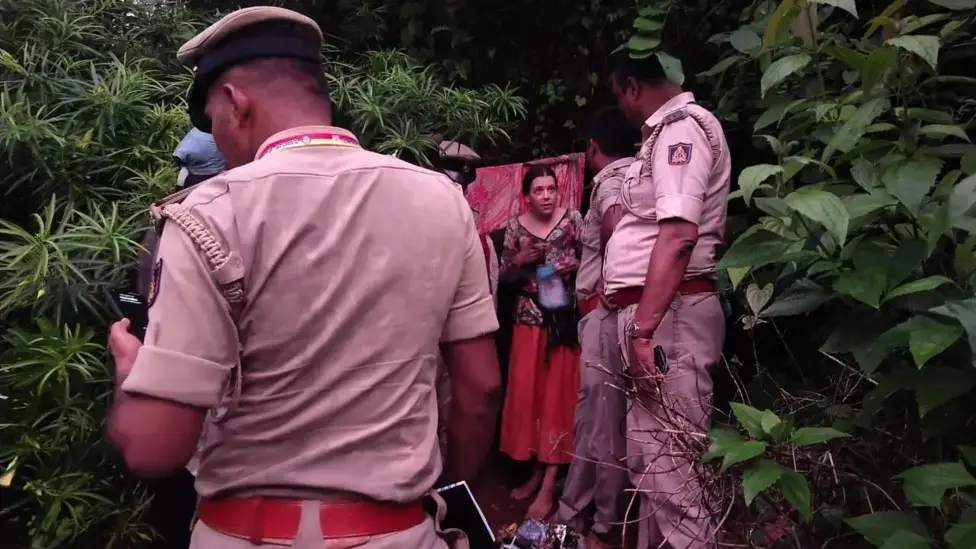 The mother had to be convinced to leave the cave, where she had been living for at least a week (Karnataka Police Department)