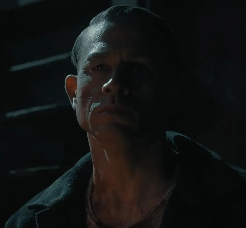 Ed Gein's stroy shows the murder of his brother, Henry (Netflix)