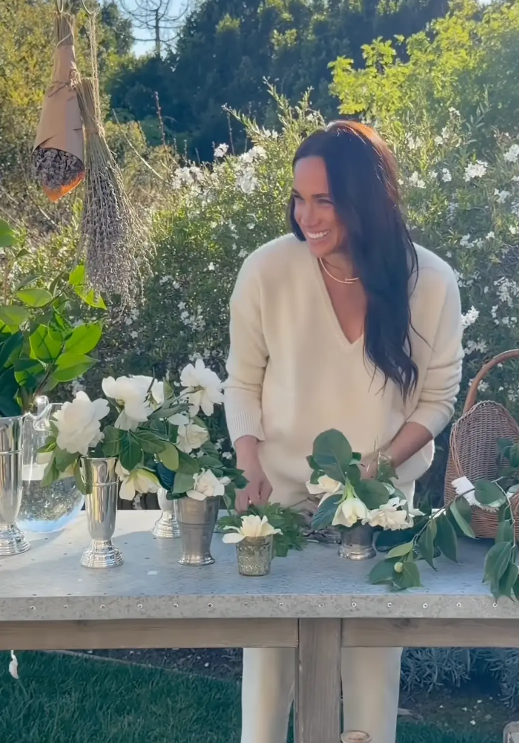 The video saw Lilibet and Archie get involved with Meghan as she arranged flowers (Instagram/@meghan)