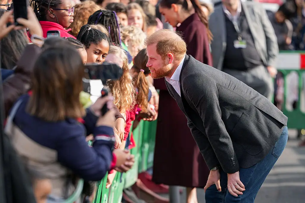 Prince Harry greeting young onlookers in Nottingham (Christopher Furlong/Getty Images)