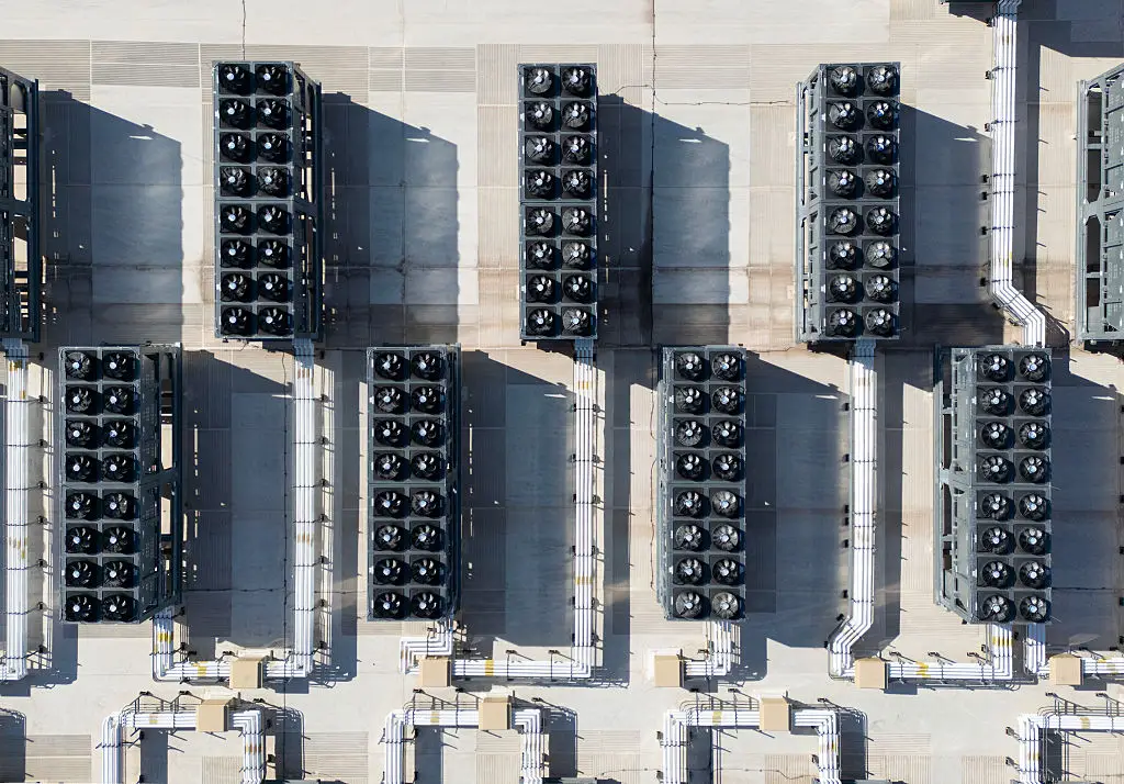 Cooling vent fans on the roof of a data centre in Virginia (Photo by ANDREW CABALLERO-REYNOLDS / AFP via Getty Images)