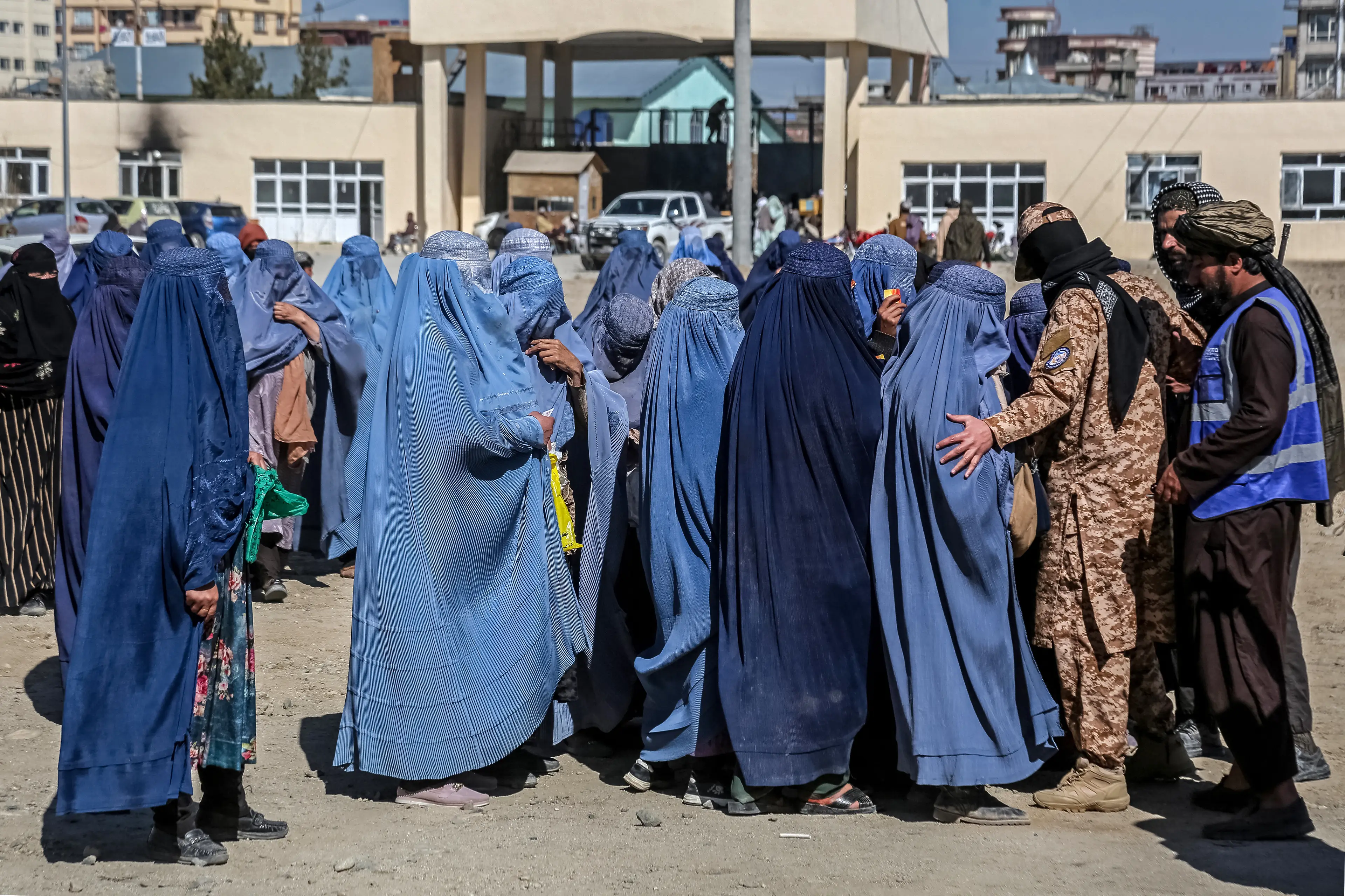 She claimed women were being beaten for failing to abide by a strict new dress code (Mohammad Faisal NAWEED / AFP via Getty Images)