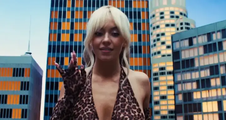 In another scene, she bizarrely becomes a giant and breaks a window with her breasts (HBO)