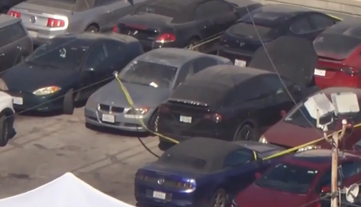 The car taped off by a police cordon (City News)