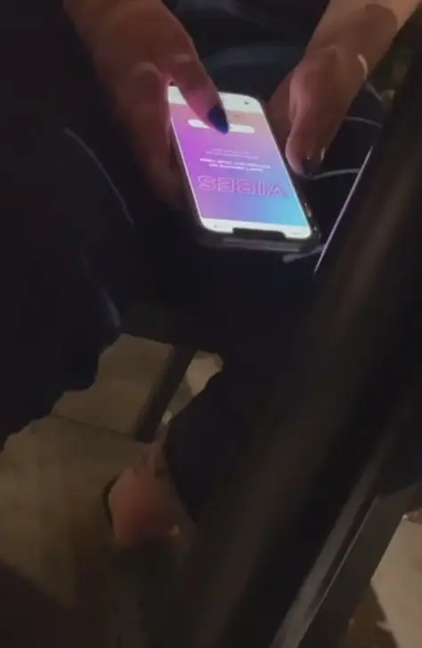 The social media user capture the moment under their table.