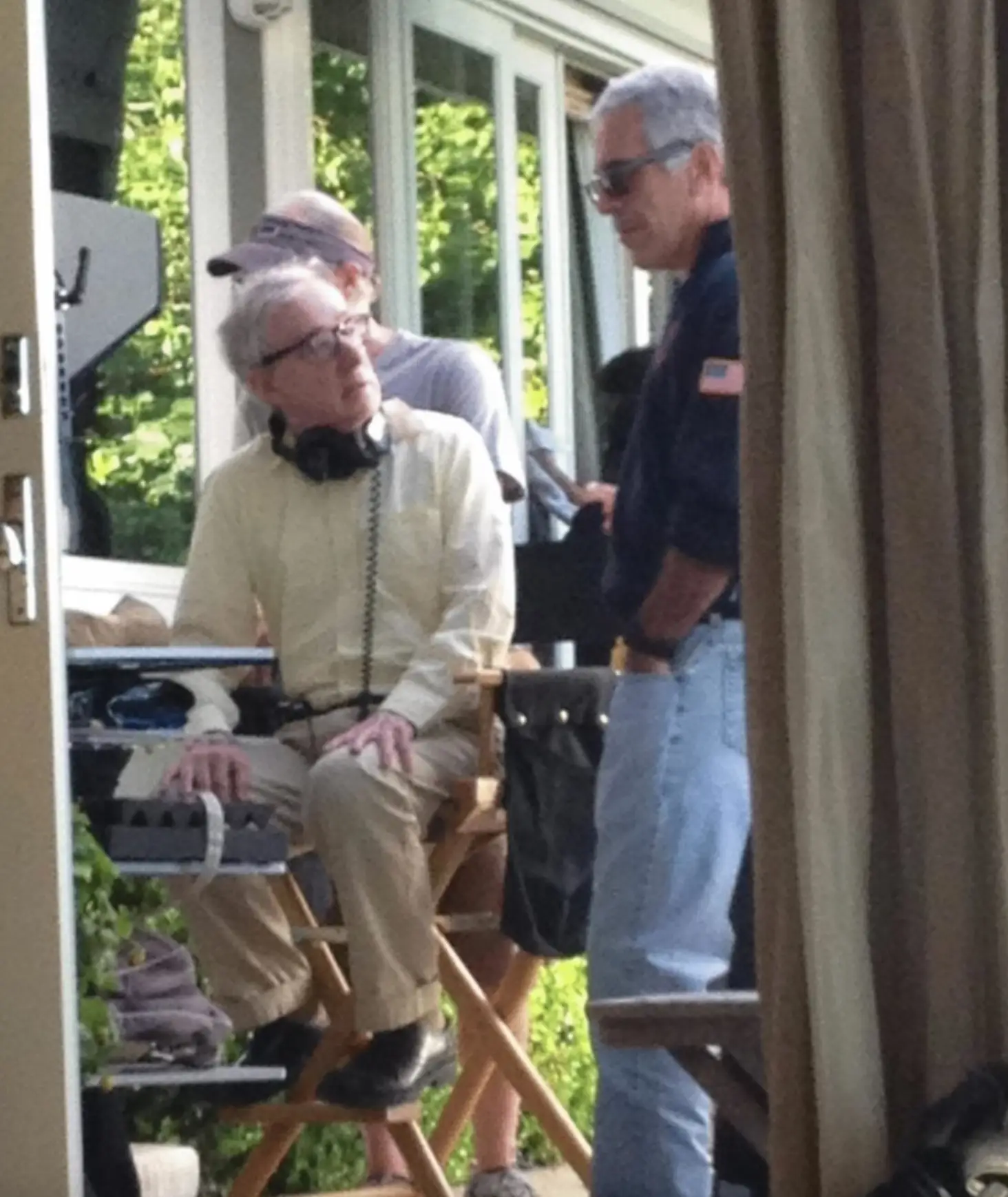 One photo shows Woody Allen and Epstein talking on what looks like a film set (House Oversight Committee)