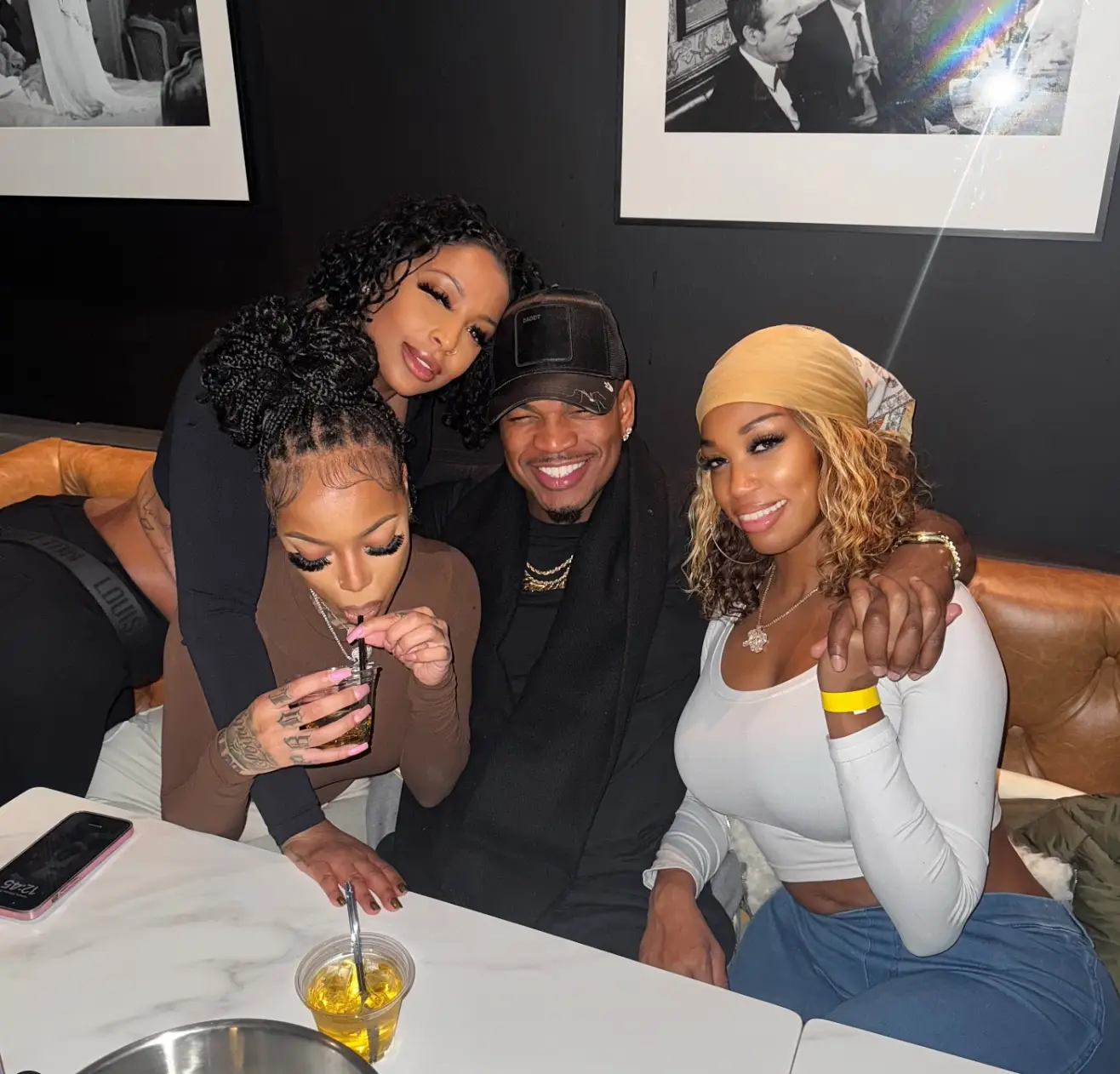The father-of-seven pictured with three of the four women he's currently dating (Instagram/@neyo)