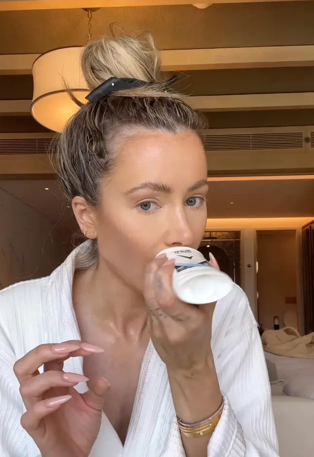 Attwood applied deodorant just above her top lip.