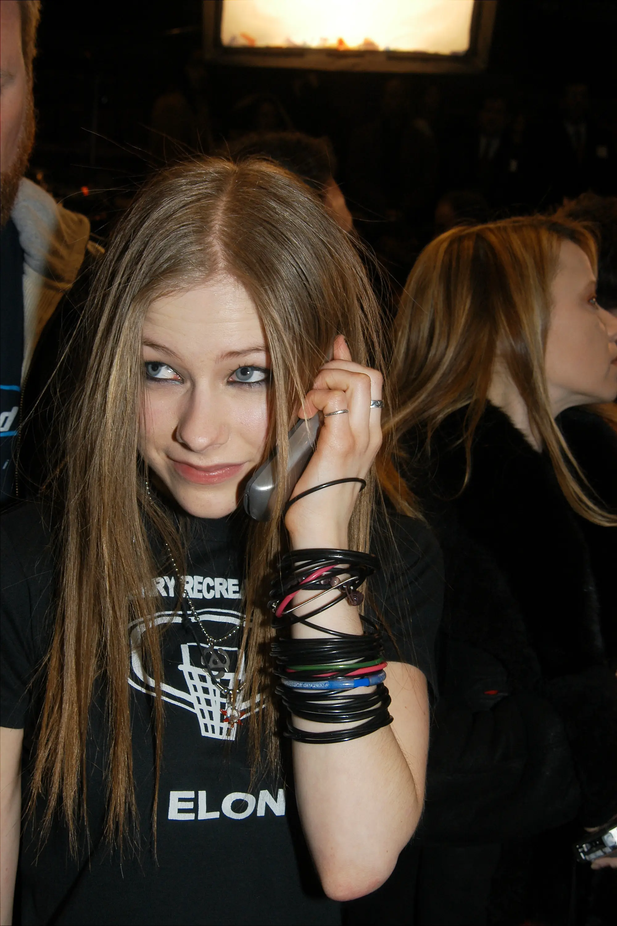 Nothing says Y2K quite like a flip phone and an Avril Lavigne playlist (Richard Corkery/NY Daily News Archive via Getty Images)