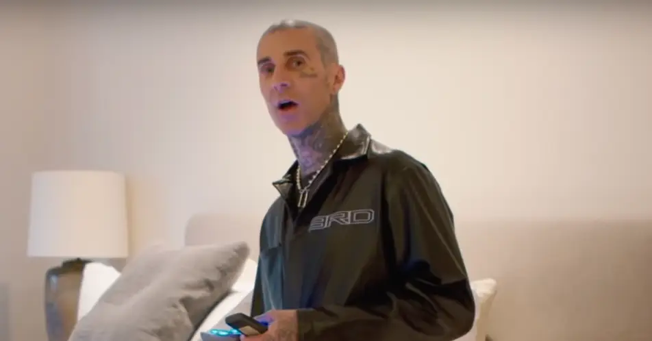 Travis keeps the candle next to his mother's rosary beads.