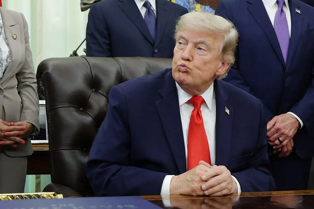 Donald Trump has reportedly been given permission to hand the World Cup trophy to the winners (Alex Wong/Getty Images)
