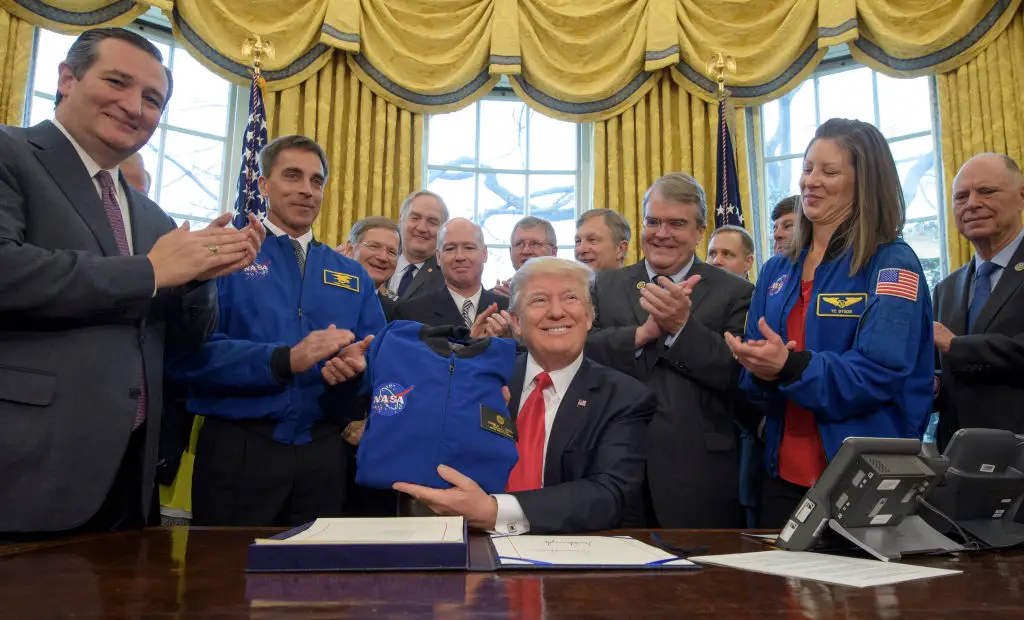 Donald Trump previously helped to fund SpaceX's mission with the Dragon capsule (Bill Ingalls/NASA via Getty Images)