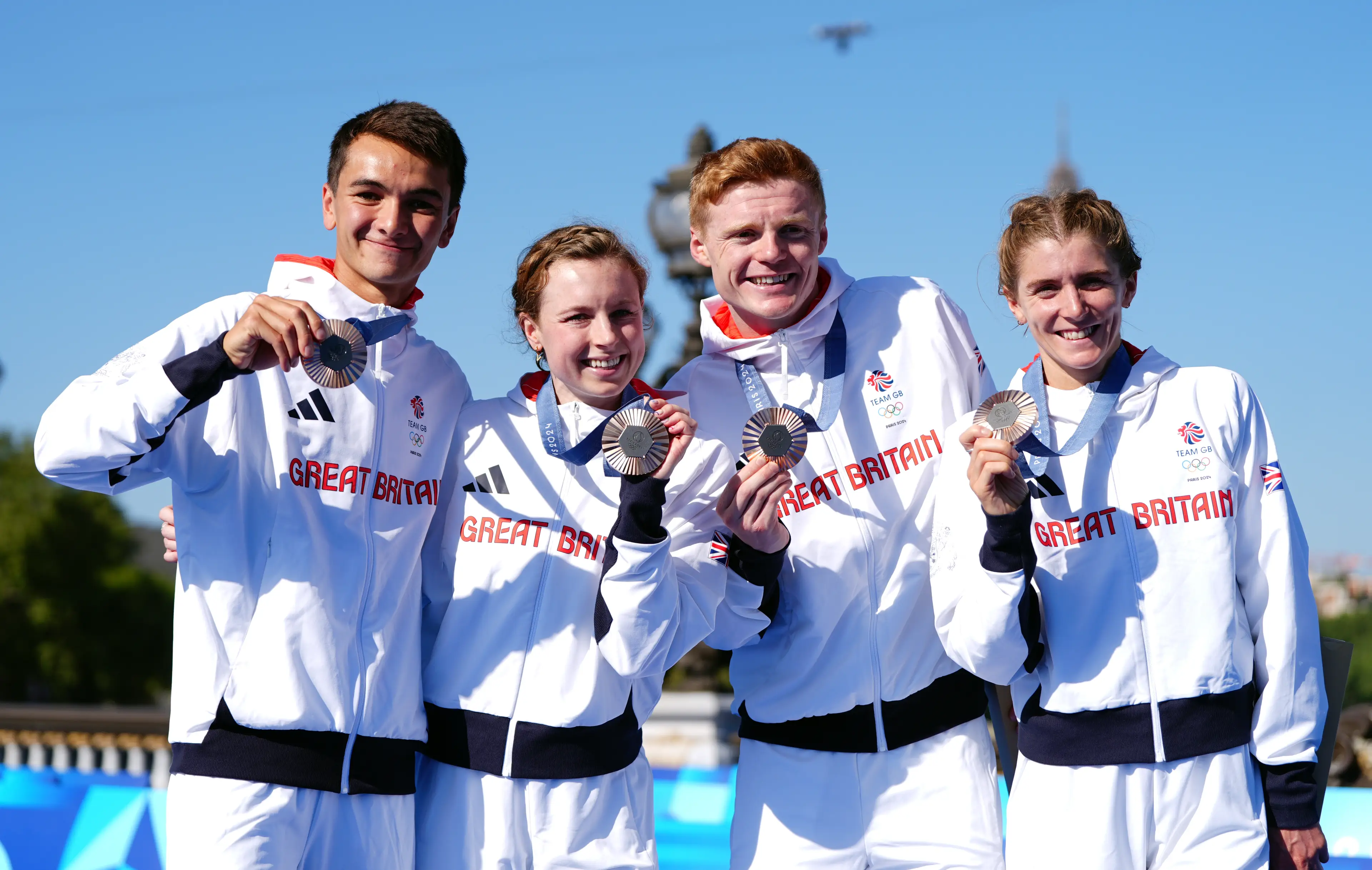 Great Britain's Alex Yee, Georgia Taylor-Brown, Samuel Dickinson and Beth Potter with their bronze medals (PA)
