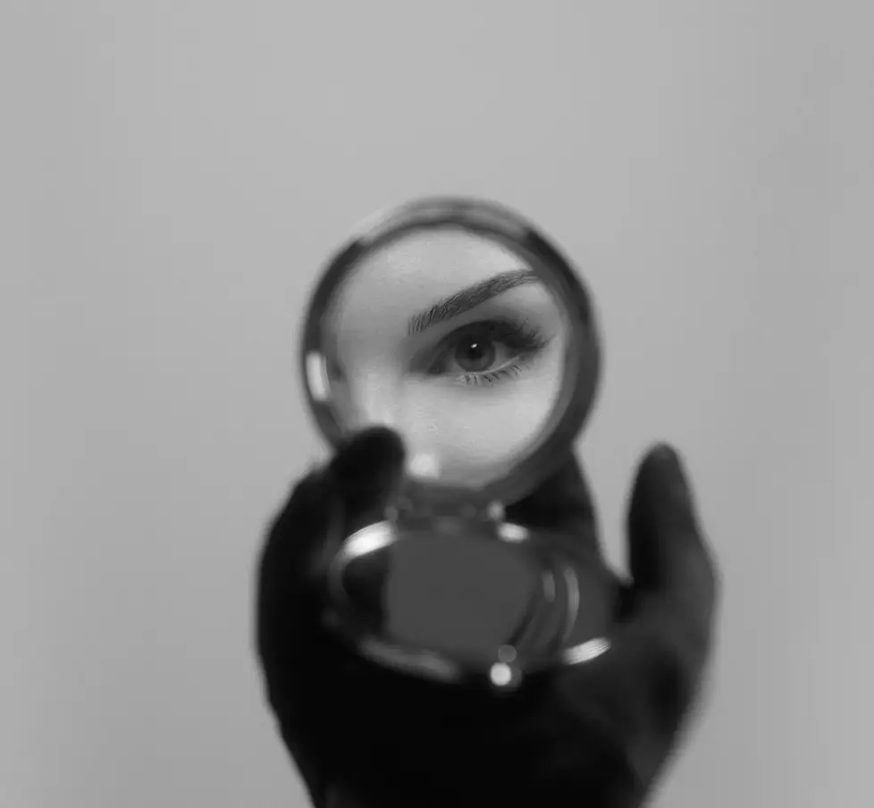 Dylan teased her face reveal with a partial mirror selfie.