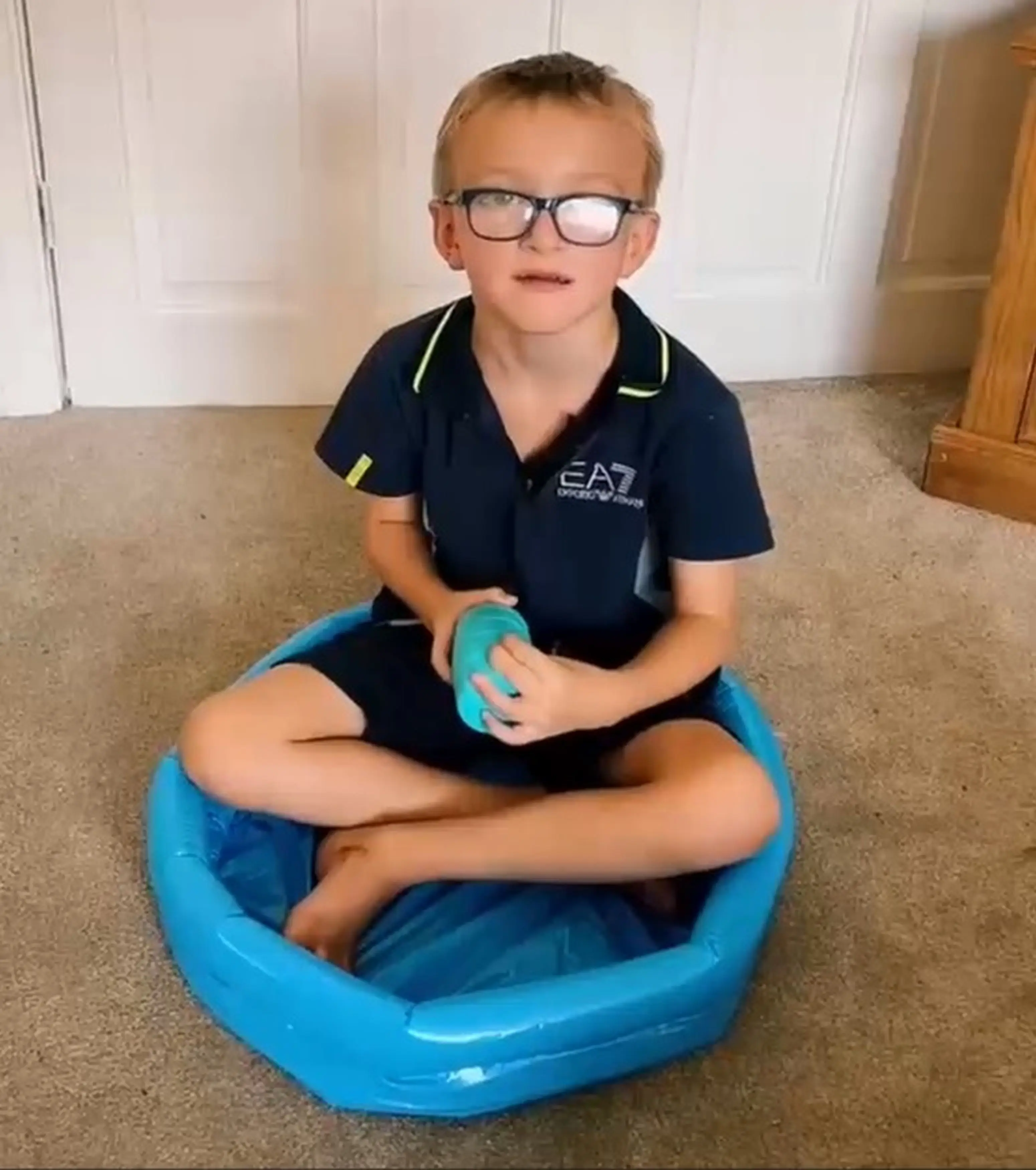 The tiny pool isn't even big enough for five-year-old Jonah.