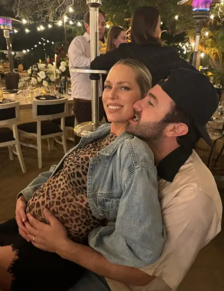 Erin Foster and her husband Simon Tikhman (@erinfoster/Instagram)