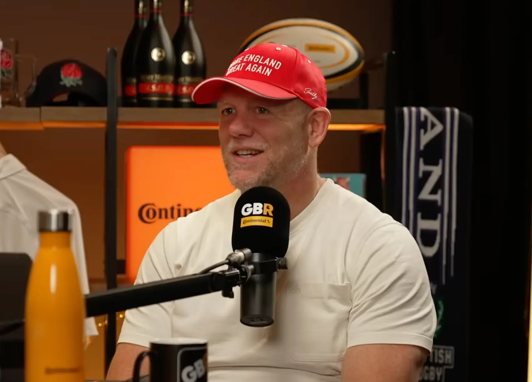 Mike Tindall, Princess Anne's son-in-law, has sparked a heated discussion after wearing a 'Make England Great Again' hat on his rugby podcast (YouTube/The Good, The Bad & The Rugby)