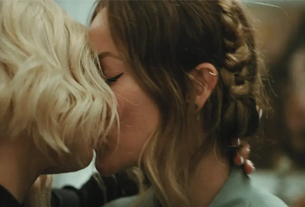 The Invite star and director Olivia Wilde has opened up about her and Penélope Cruz's character's unscripted kiss (A24)