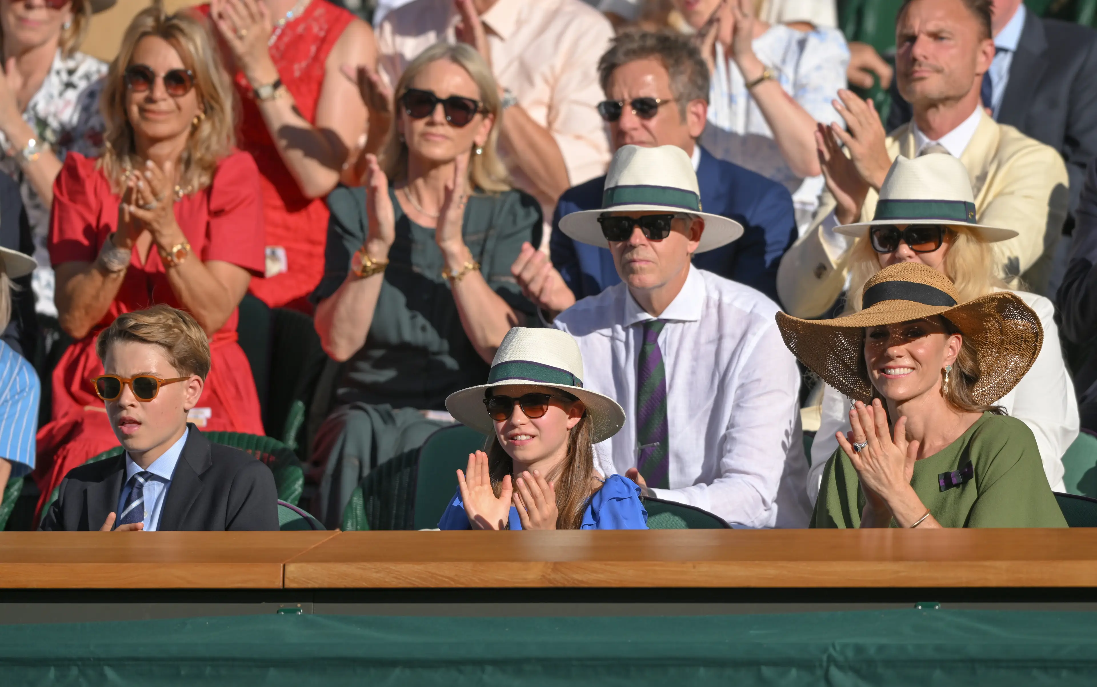 Kate and Charlotte wore sun-hats and shades (Karwai Tang/WireImage)