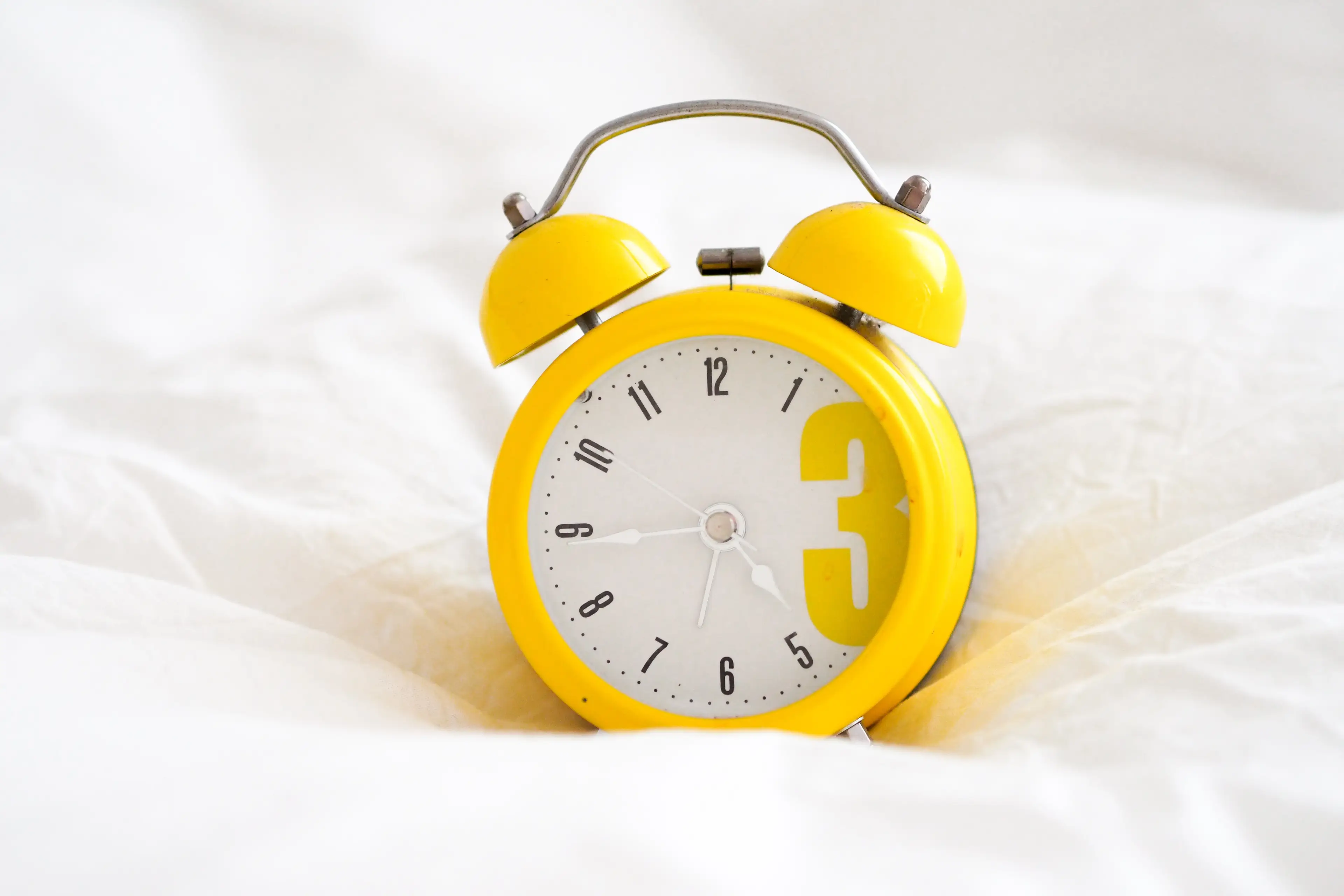 Why do we wake up hours before our alarms?