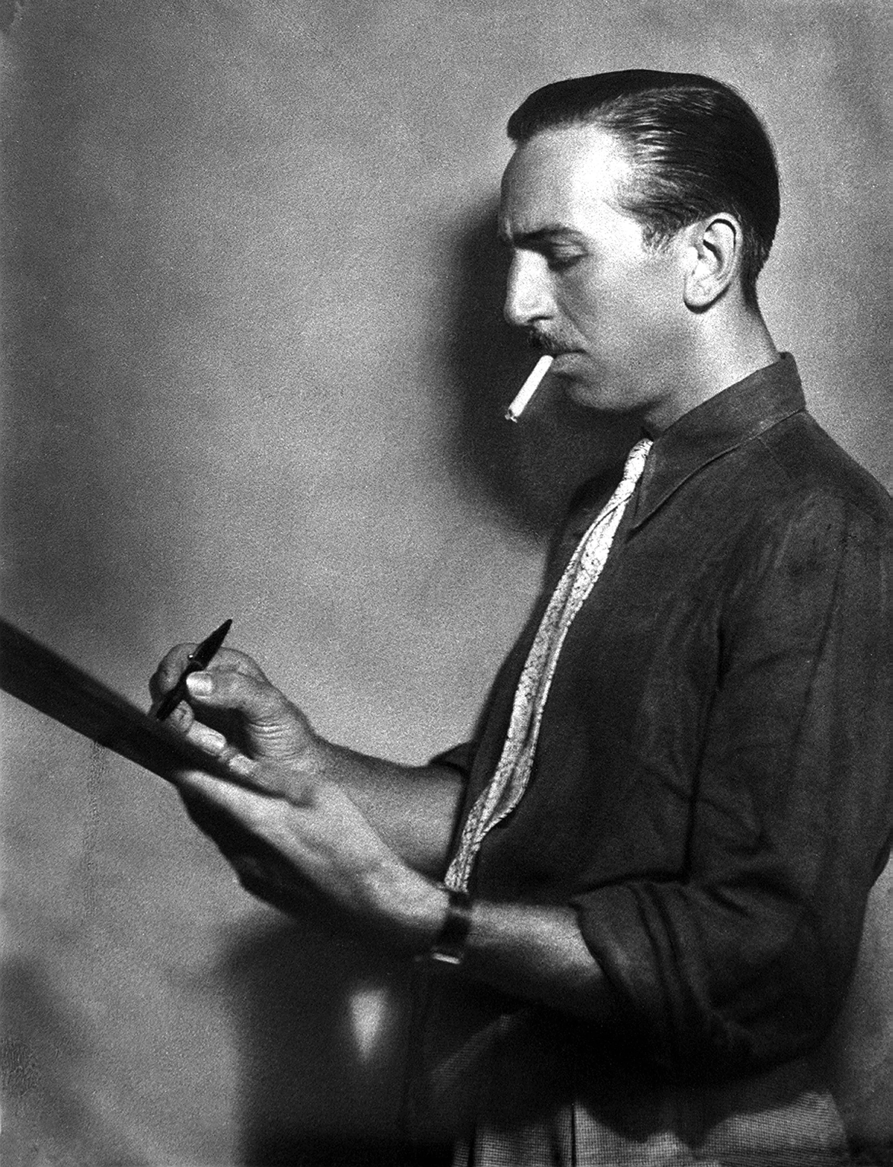 It seems as though the creator always had a cigarette in hand (Fototeca Gilardi/Getty Images)