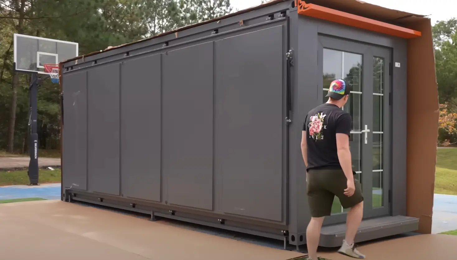 Graham unboxed the house in the video (YouTube/Unspeakable)