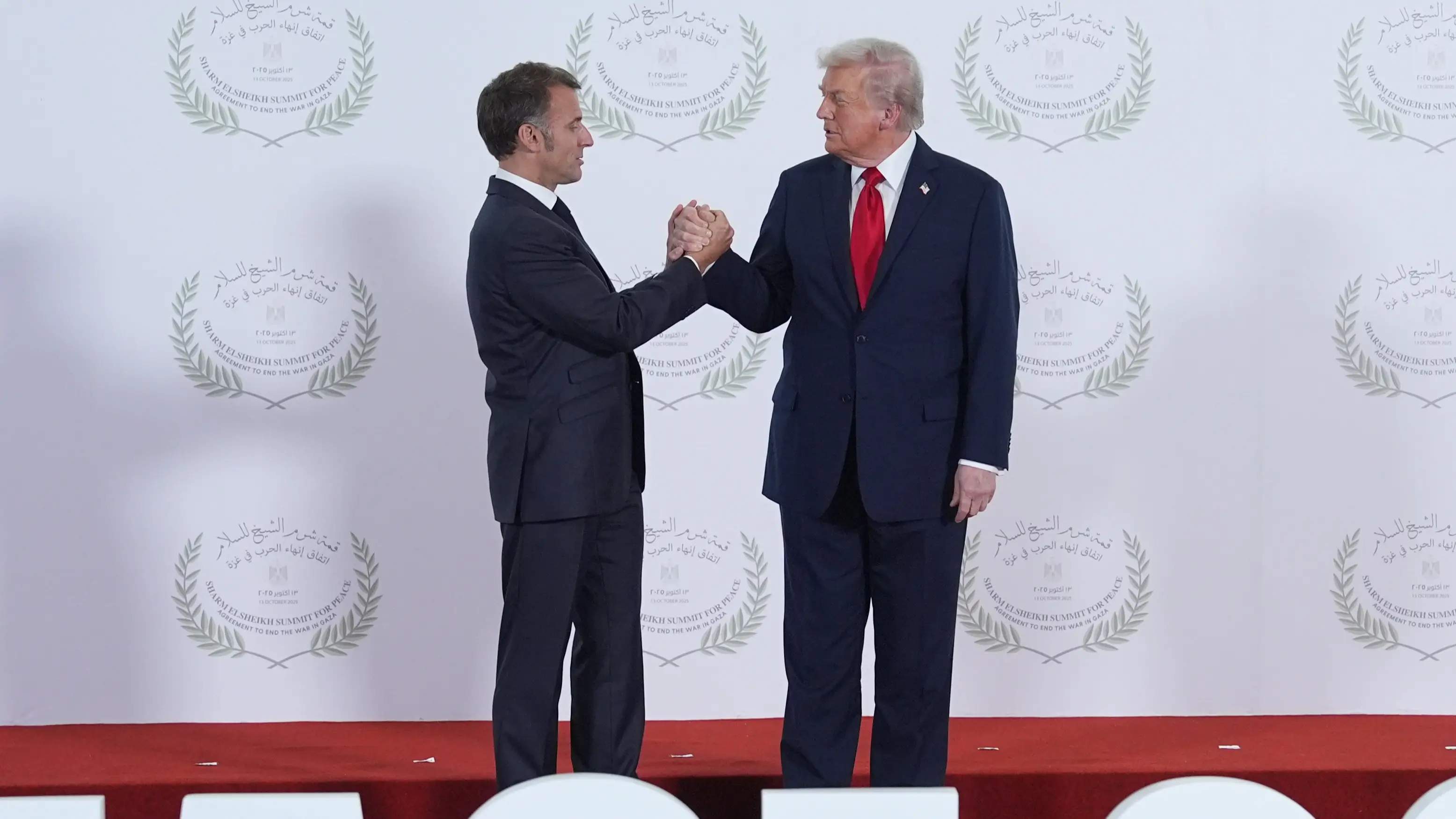 Donald Trump's 'awkward' handshake with Emmanuel Macron leaves people confused over one detail