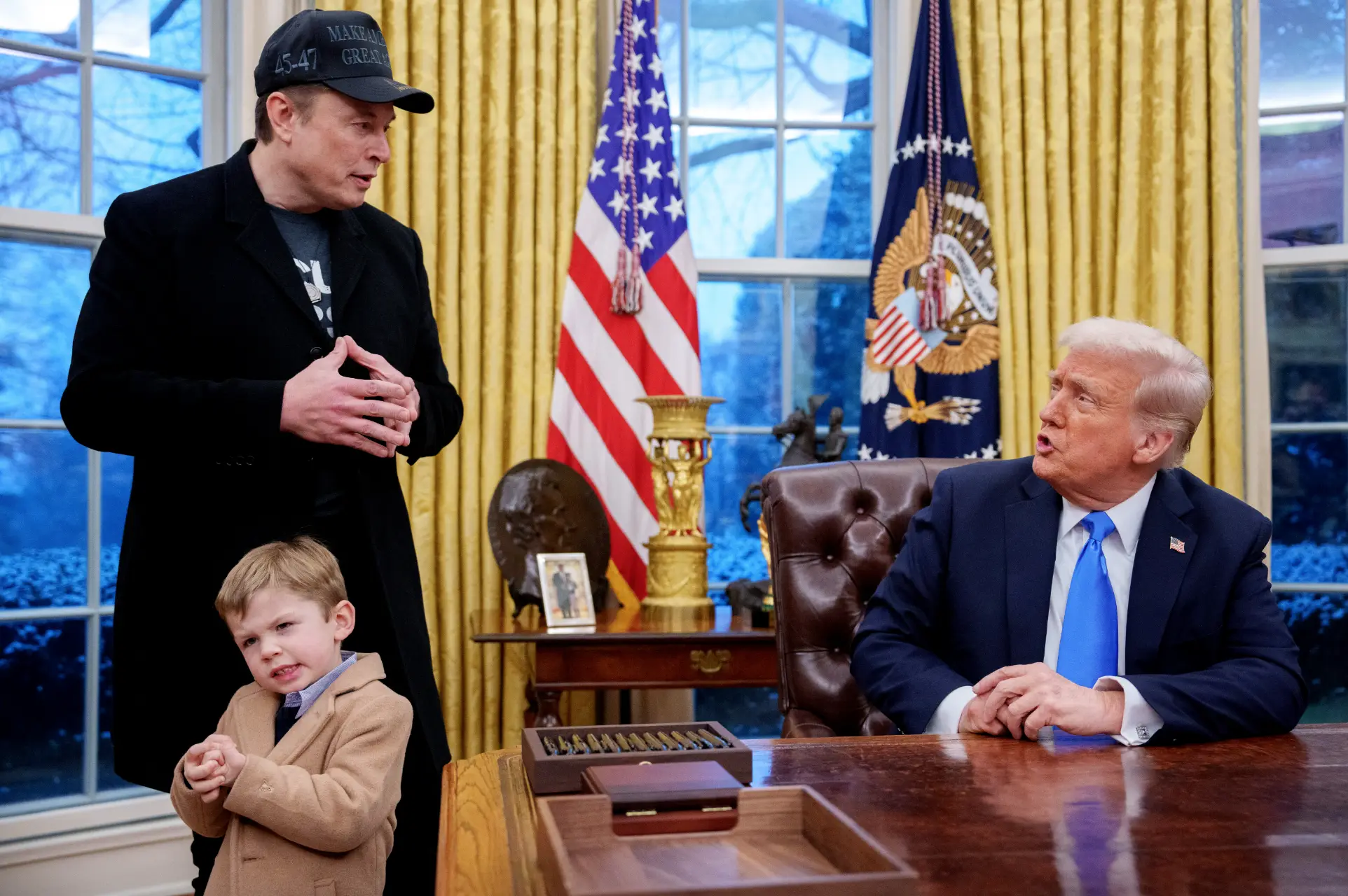 He announced that the desk would be undergoing refurbishments days after Elon Musk and his son X visited the White House (Chip Somodevilla/Getty Image)