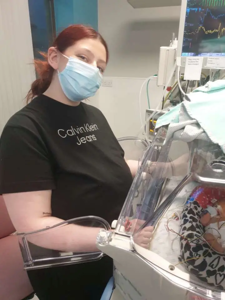 Caitlin thought her partner was joking when he told her the triplets were actually girls.