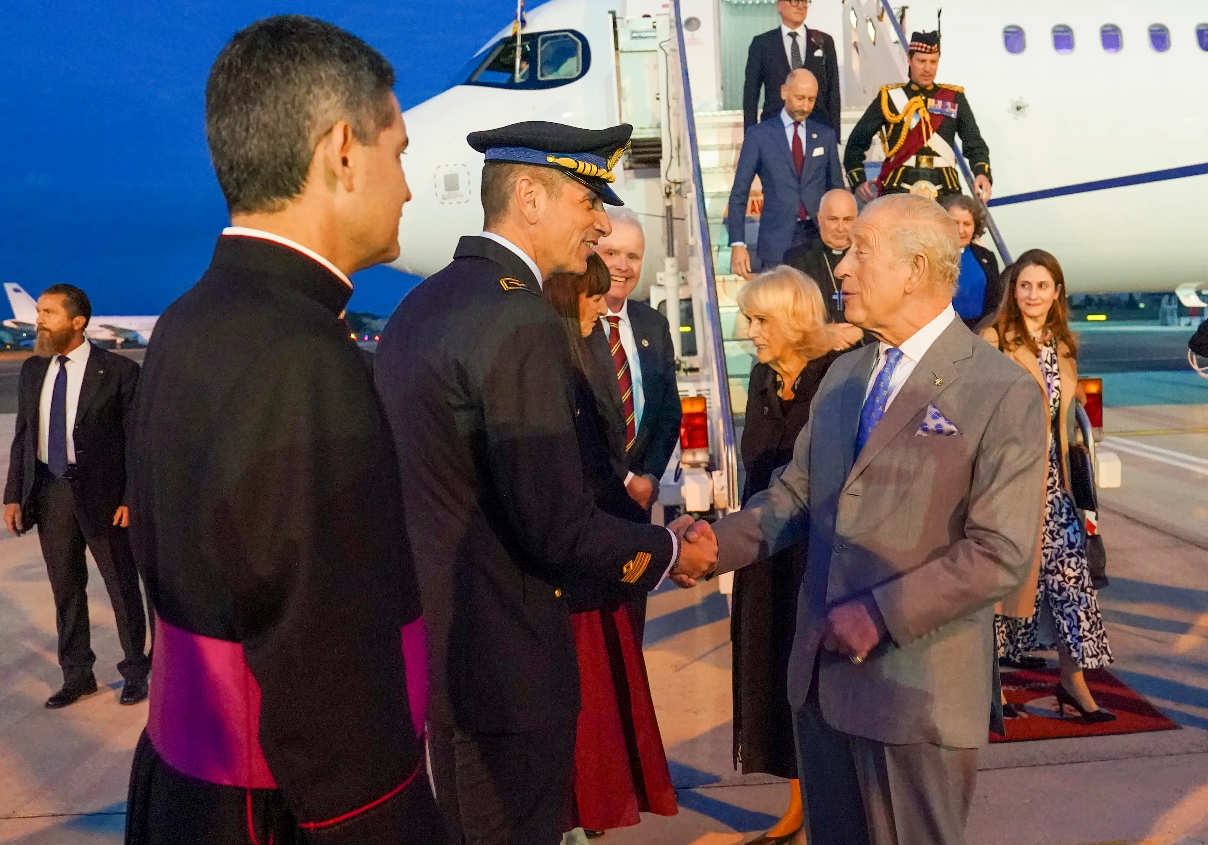Thompson (pictured disembarking the plane at the top right) has attended a number of high profile events (Arthur Edwards -Pool via/WireImage)