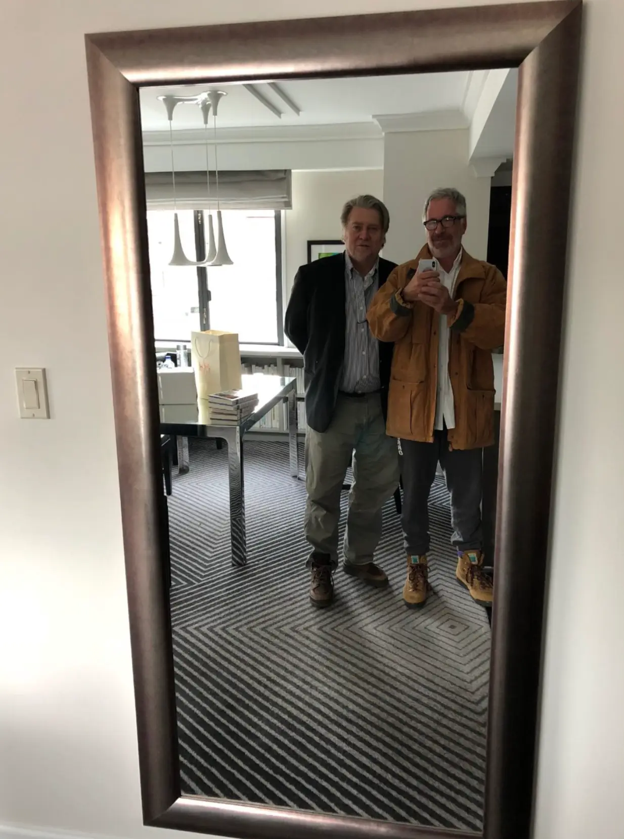 Another photo shows former Trump adviser Bannon posing with Epstein (House Oversight Committee)