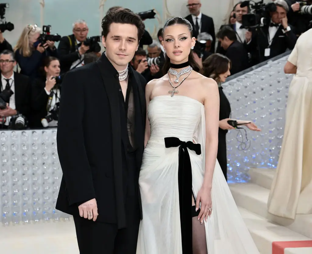 Brooklyn Beckham and his wife Nicola Peltz have distanced themselves from the Beckham family (Jamie McCarthy/Getty Images)