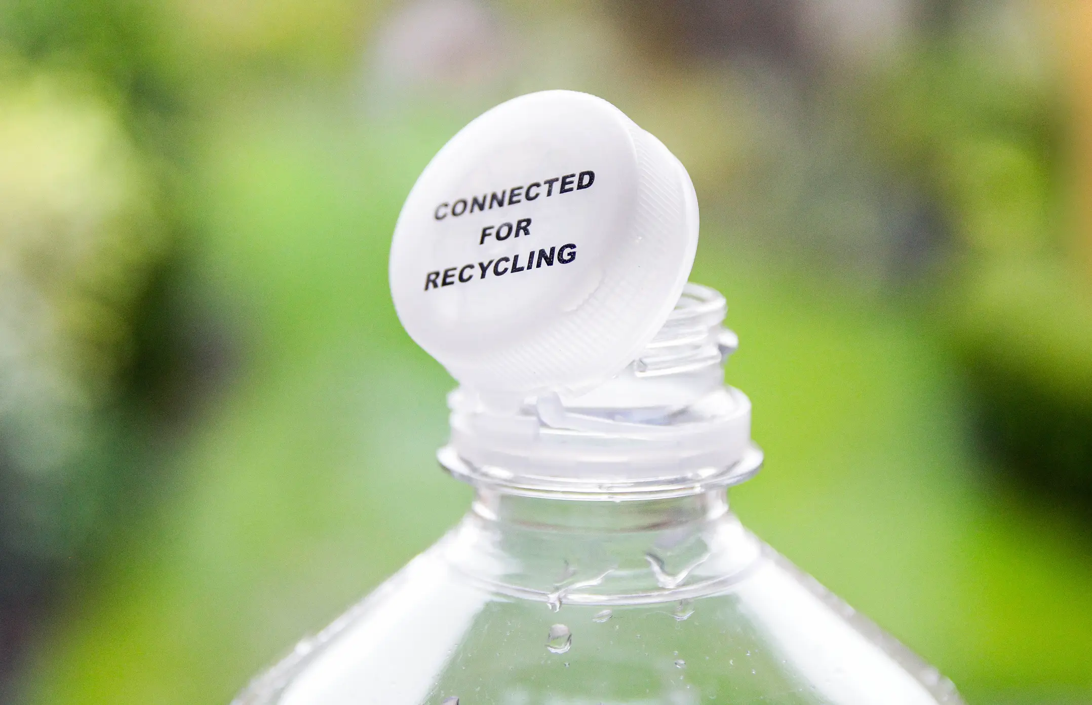 Many plastic caps now come attached to the bottle. (Kinga Krzeminska / Getty Images)