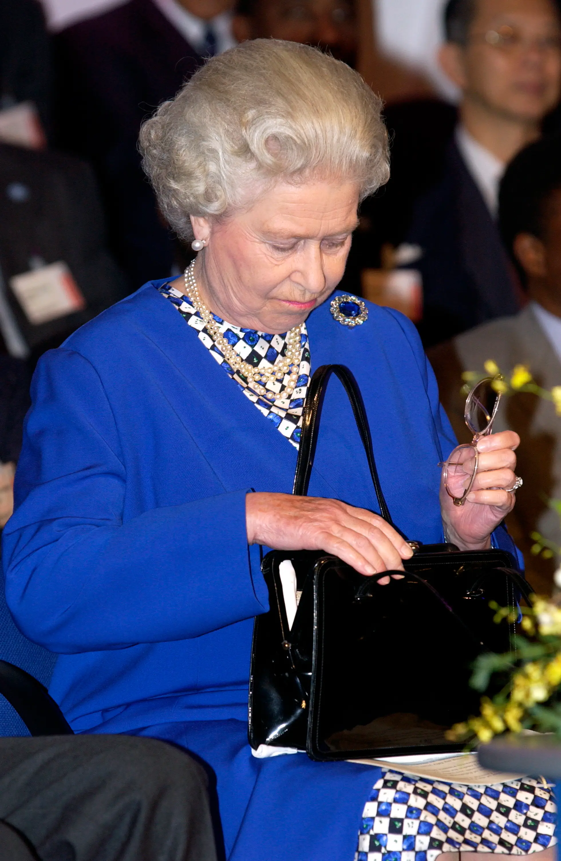 Queen Elizabeth II was rarely seen without a handbag during royal engagements (Tim Graham Photo Library via Getty Images)