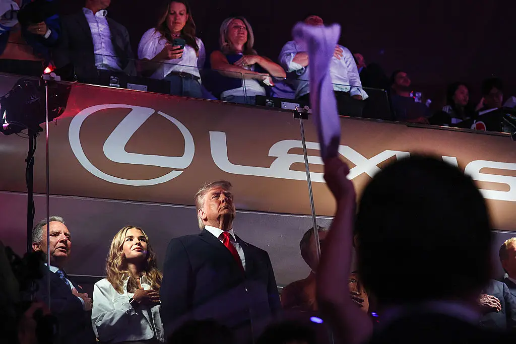 Trump critics and fans alike debated whether he was booed or cheered during the game (Samuel Corum / Stringer / Getty Images)