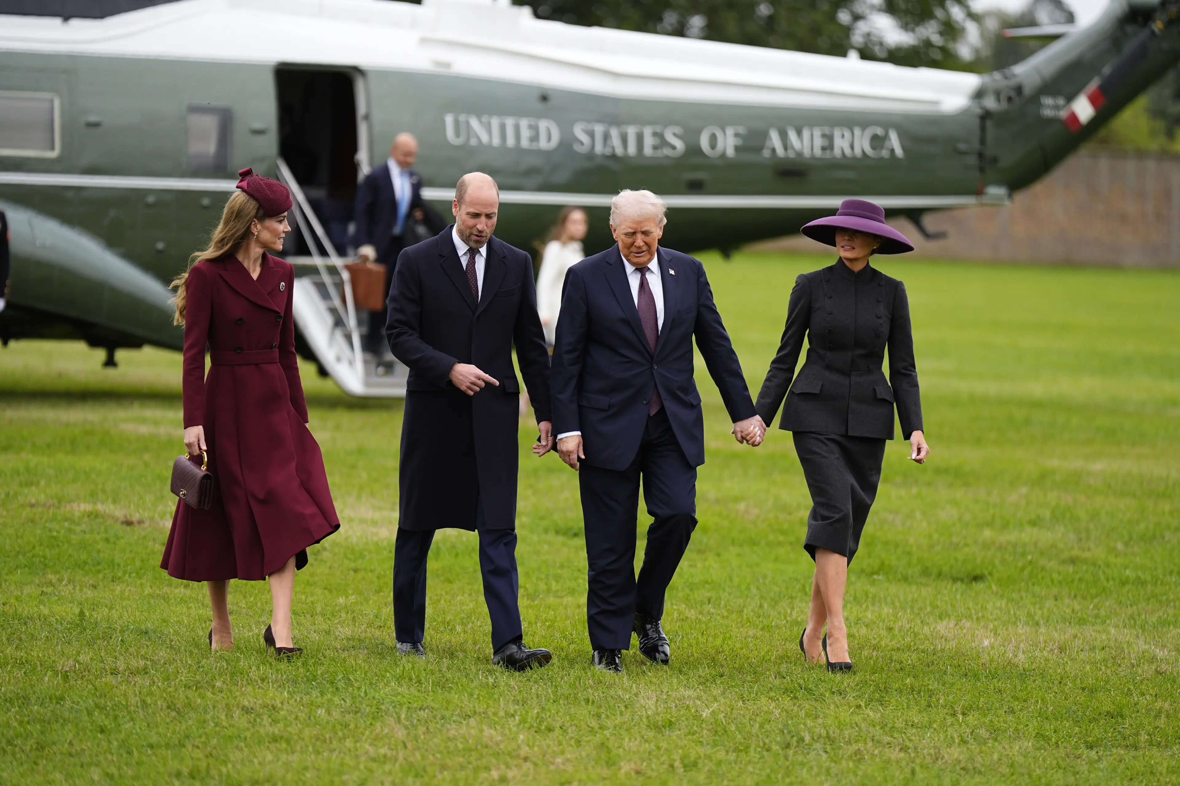 They chatted as they walked across the lawn (Aaron Chown - WPA Pool/Getty Images)