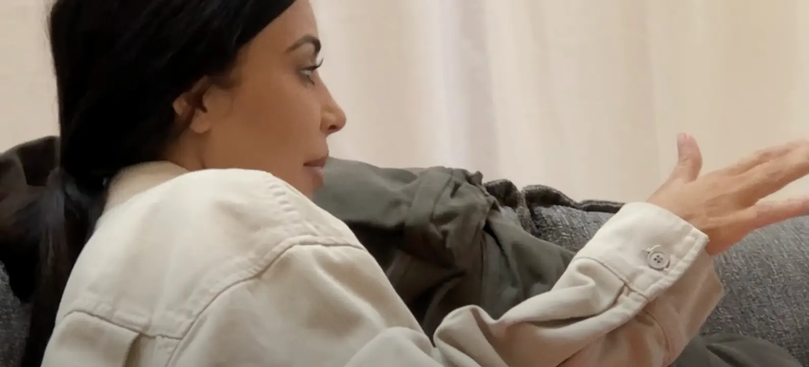 A never-before-seen clip of Kim Kardashian and Kanye West has just been released (YouTube/@InWhoseNameMovie)