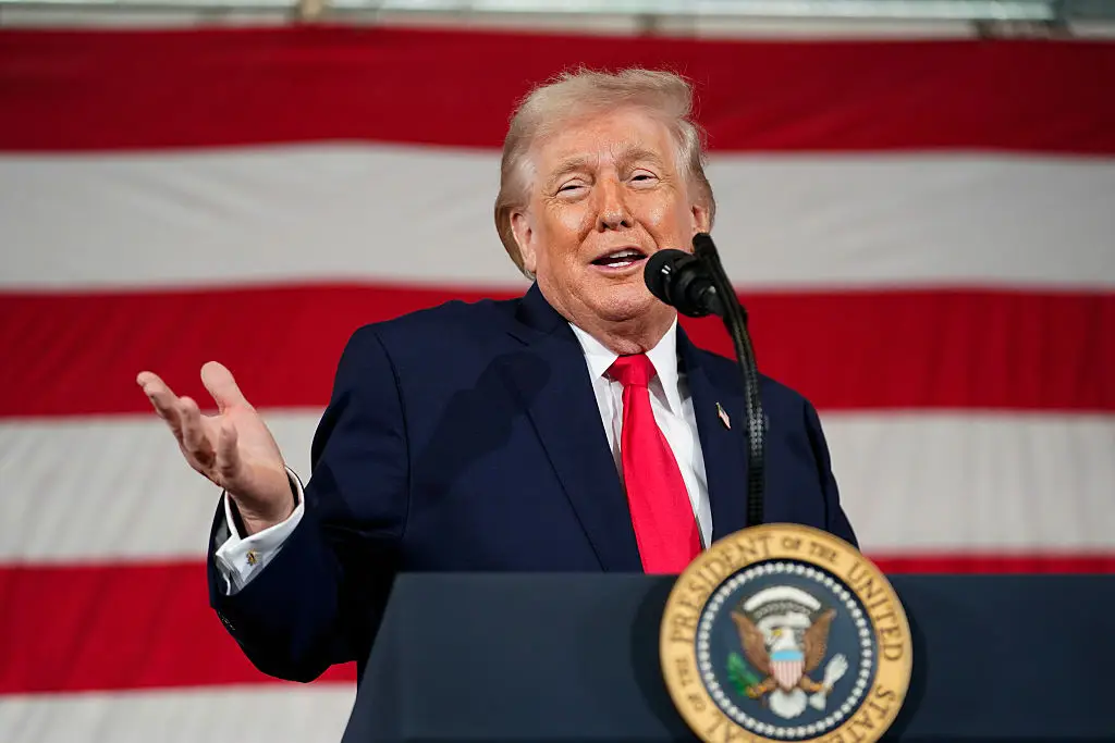 Trump joked about 'having' to invite the women's team to the State of the Union address at the White House (Nathan Howard / Stringer / Getty Images)