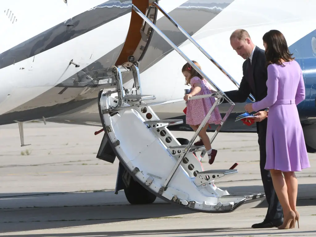 The family often travel by plane (Photo by PATRIK STOLLARZ/AFP via Getty Images)
