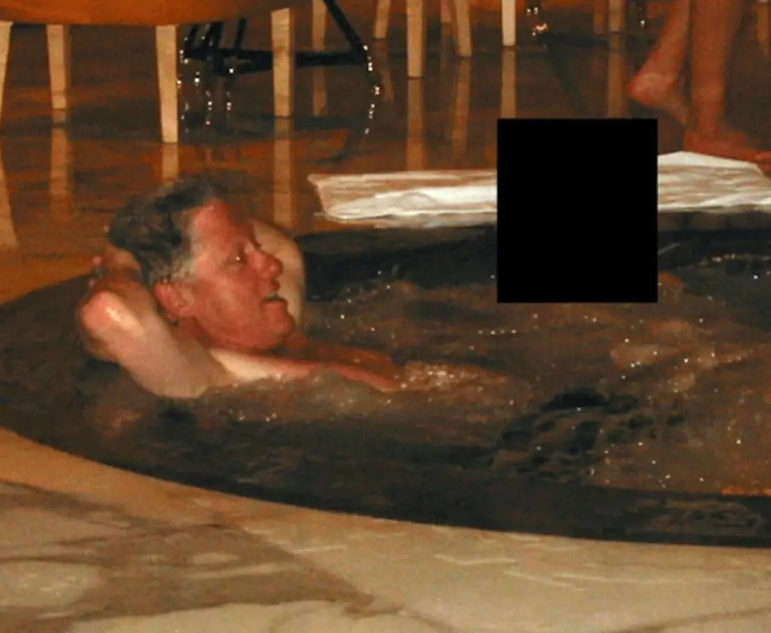 In one of the released images, Clinton was seen in a hot tub (Department of Justice)
