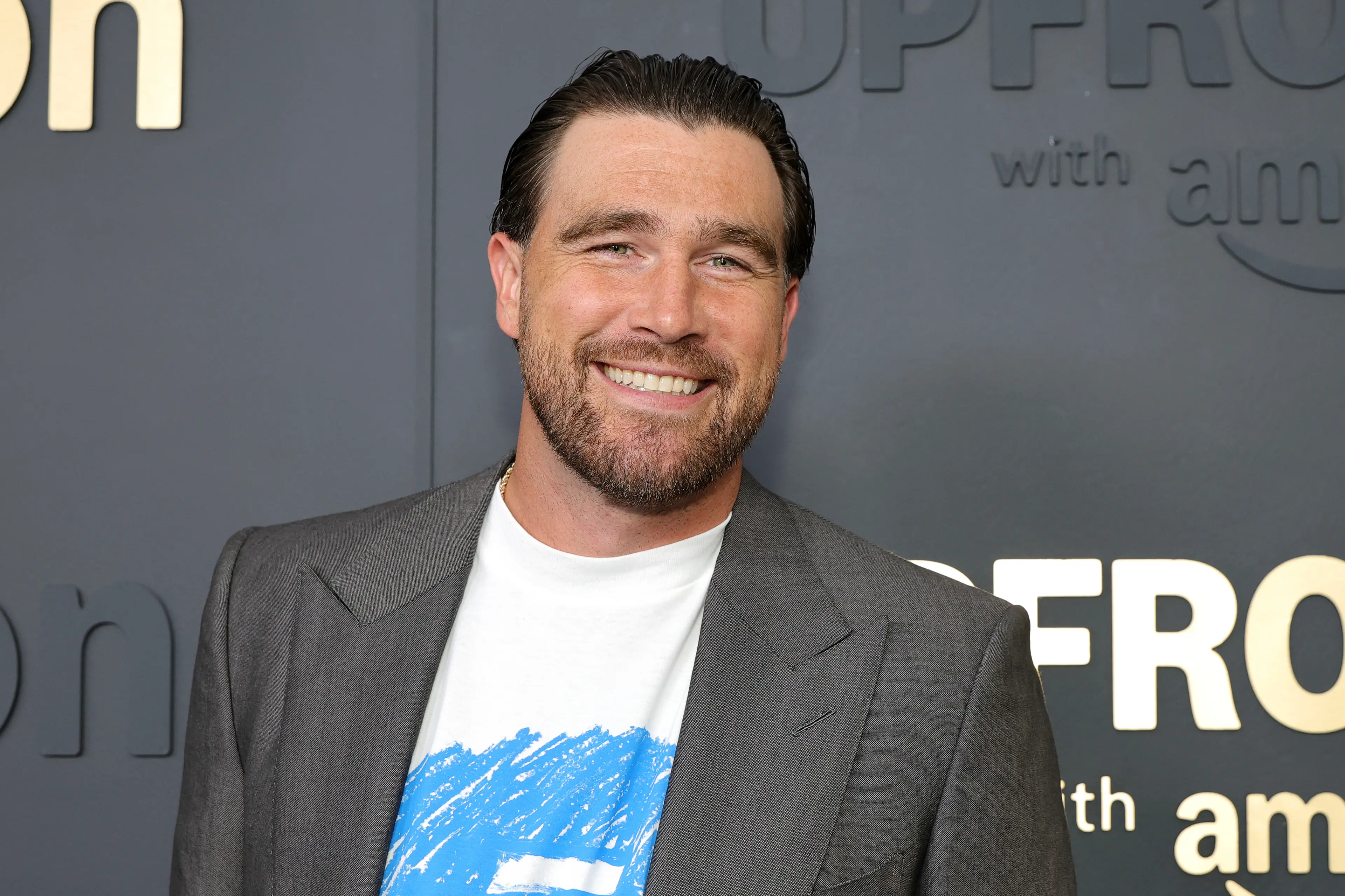 Travis Kelce is donning a new hairdo very reminiscent of the 90s (Dia Dipasupil/Getty Images)