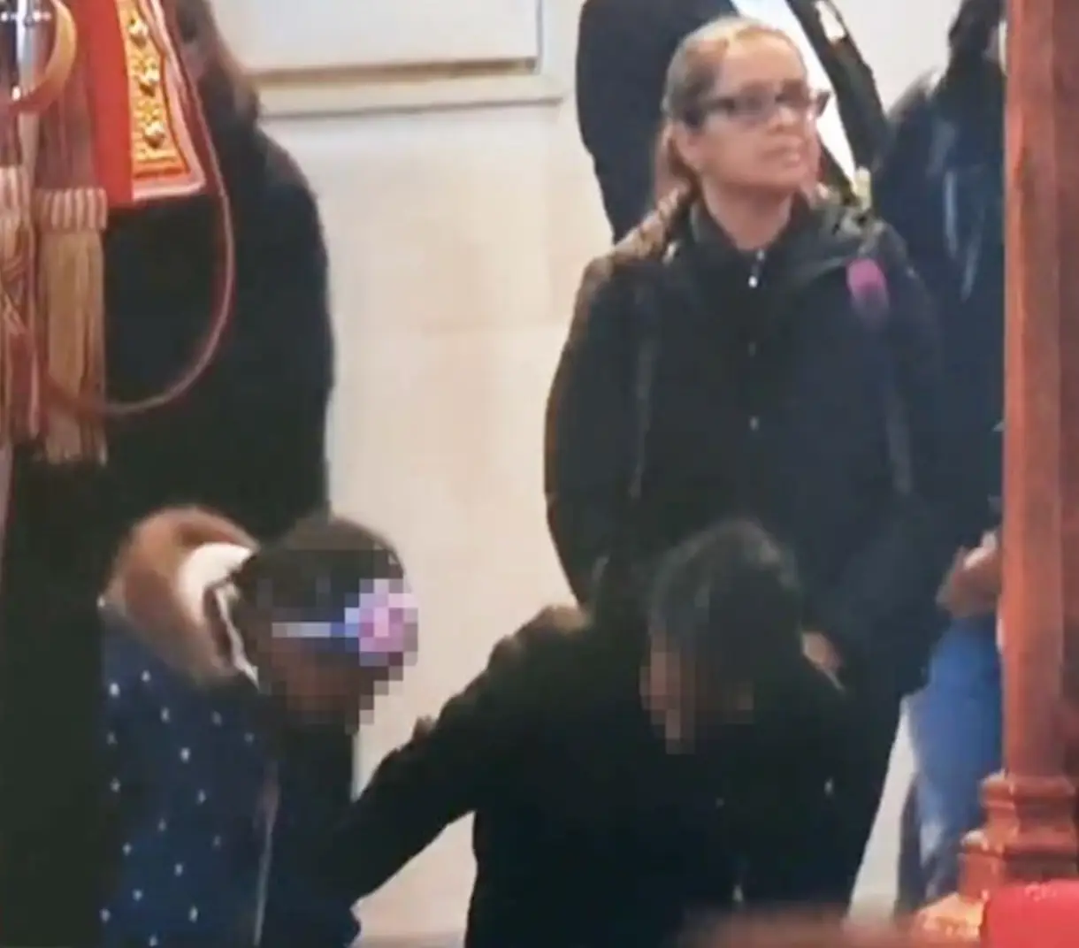 The youngsters paid their respects to the late Queen.