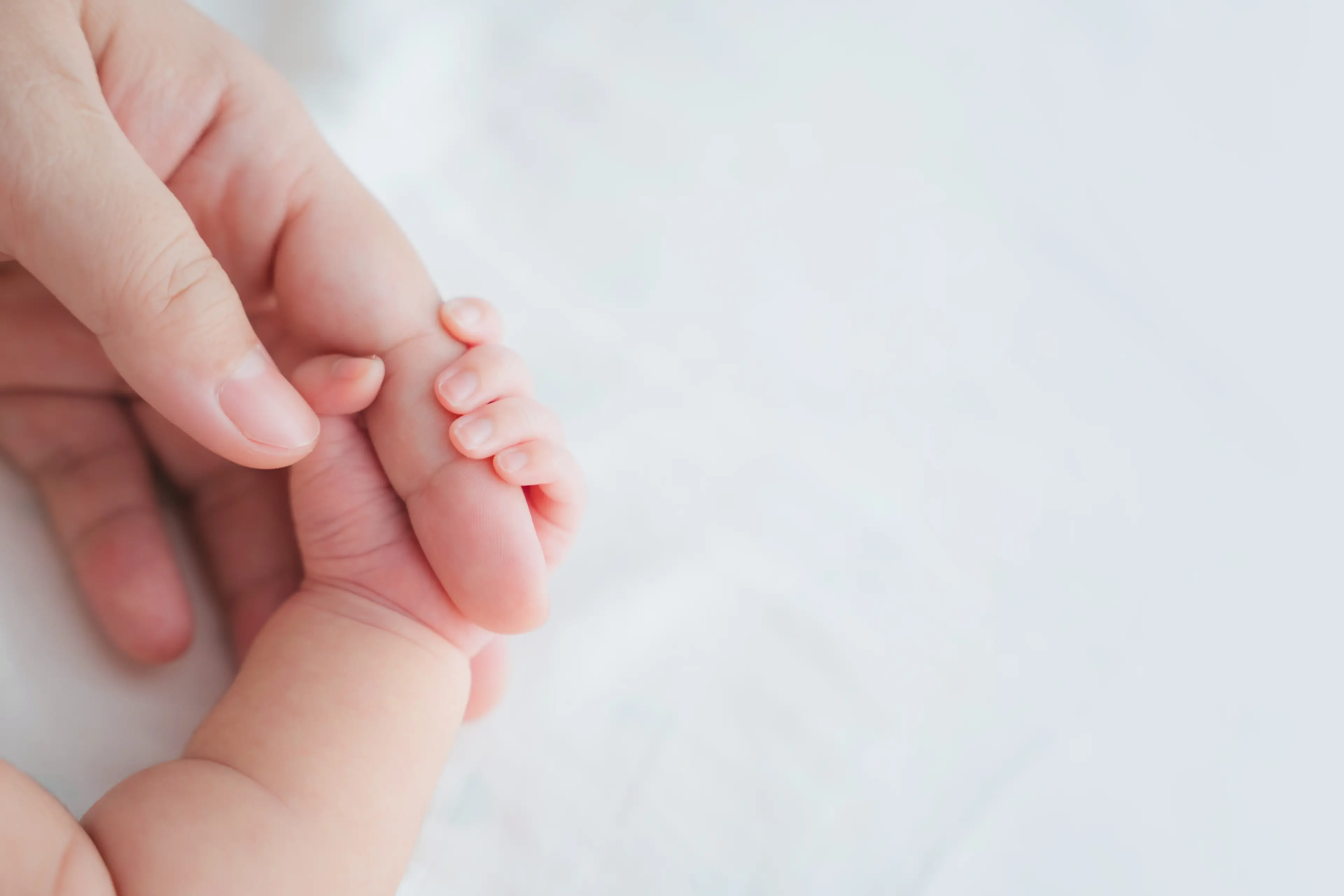 The baby has been named by the biological parents and the surrogate and their supporters (Getty Stock Images)