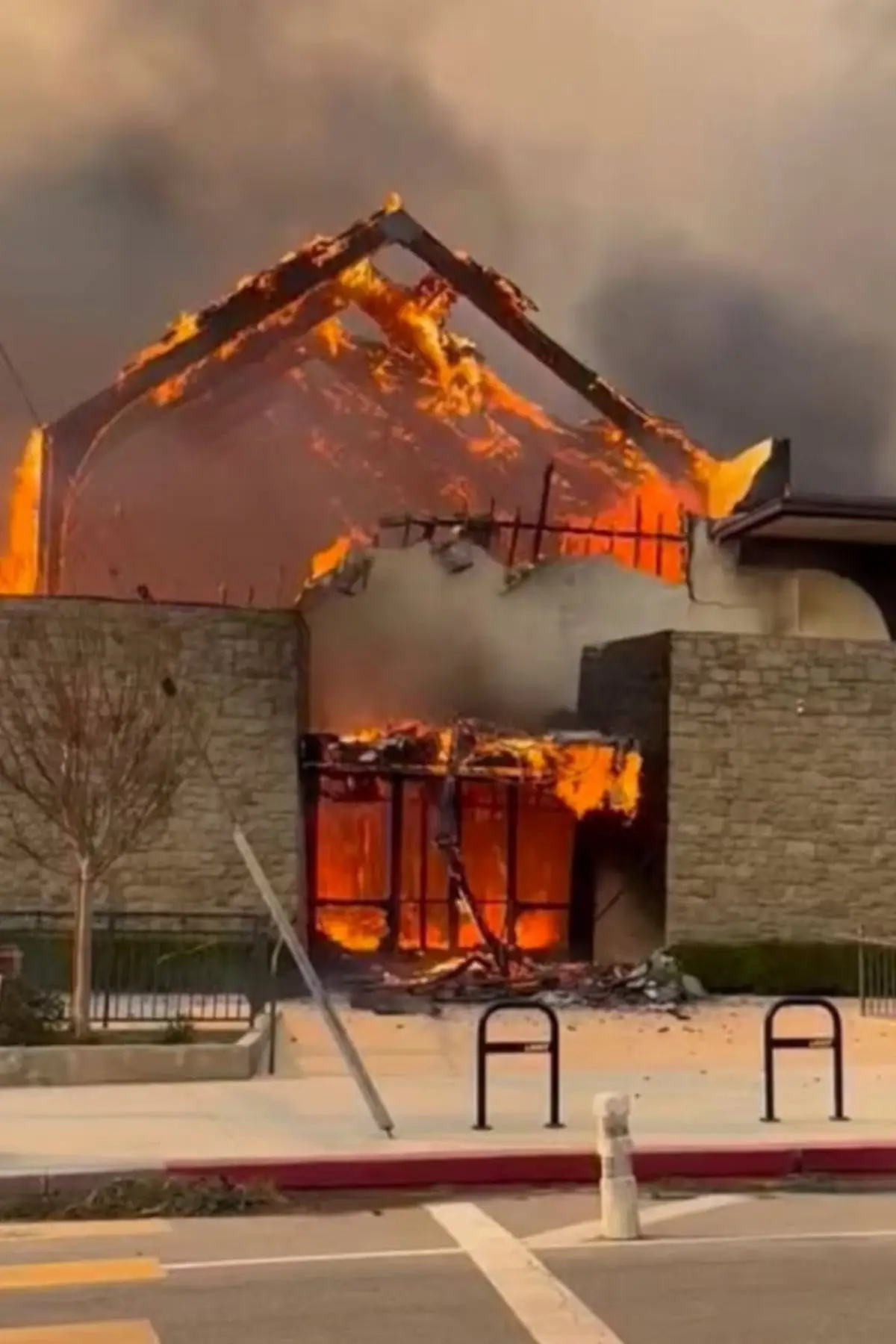 Jamie Lee Curtis shared an image of a burning church on her Instagram (Instagram/jamieleecurtis)