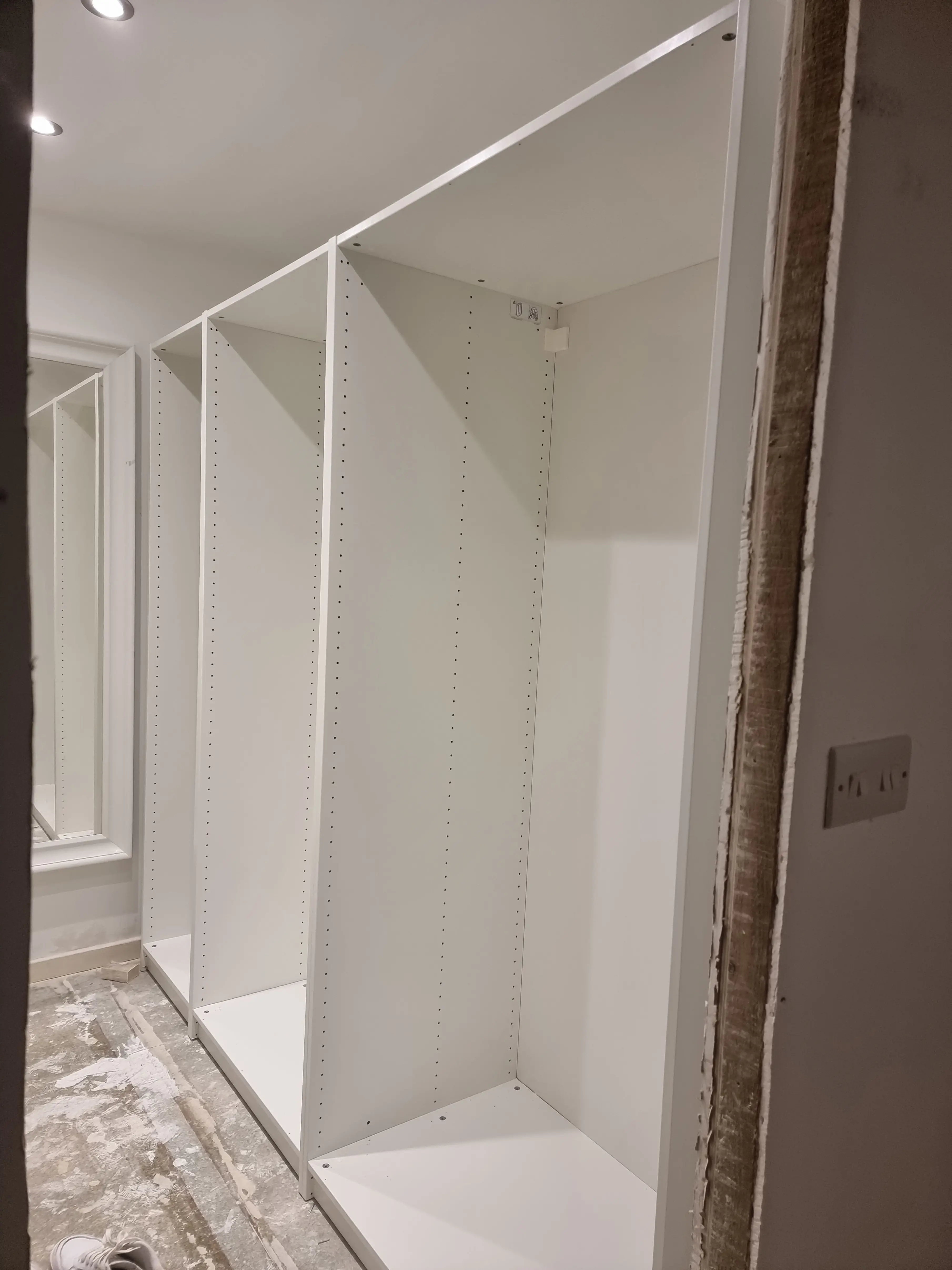 They used IKEA units and rails (