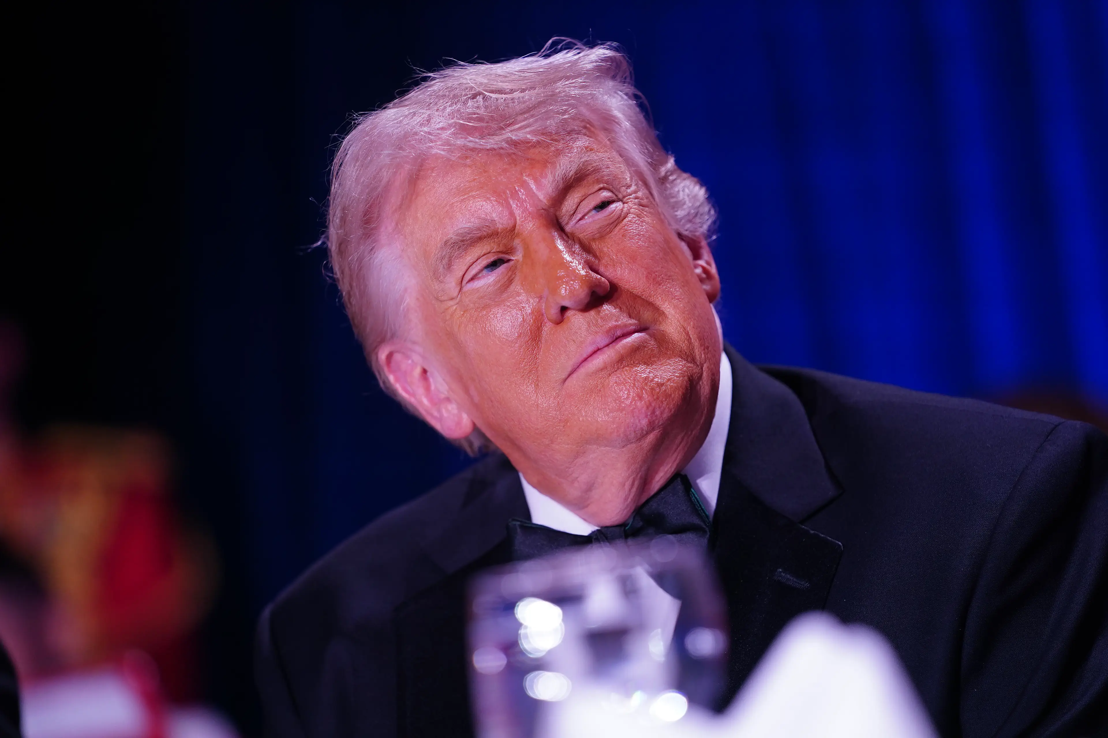 Social media users have accused Trump of 'staging' the shooting to fuel his military-manned ballroom agenda (Nathan Howard/Getty Image)